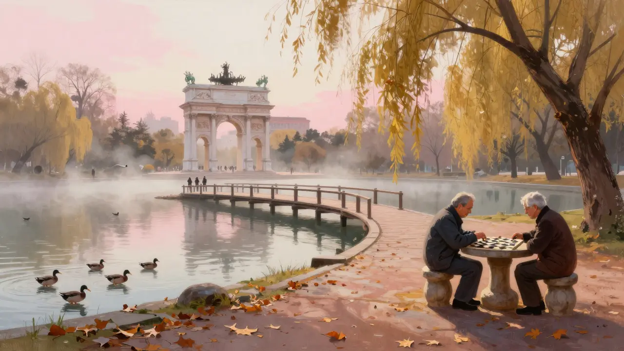 Morning mist over Parco Sempione’s lake with willow trees and a wooden bridge to a historic arch.